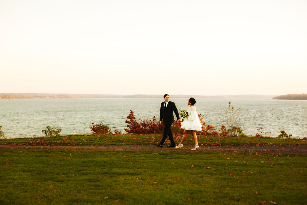 Bride & Groom strolling at French's Point