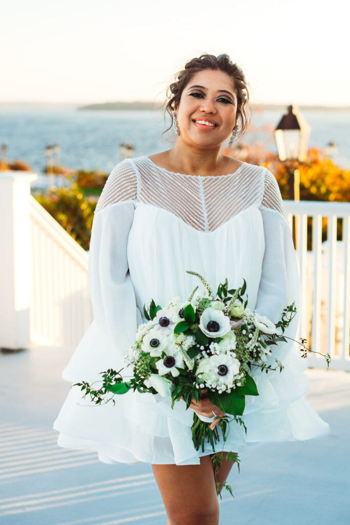Bride with bouquet by Butera The Florist