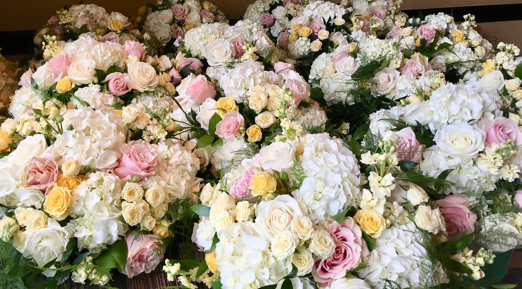 Butera The Florist Centerpieces ready for delivery to a Grand Wedding Reception